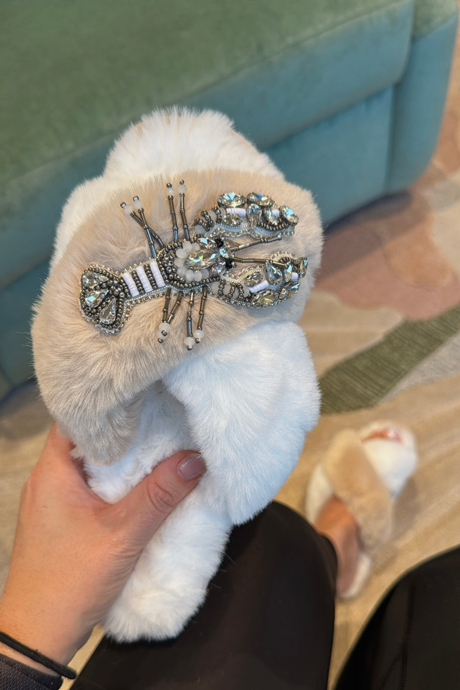 Slipper with brooch